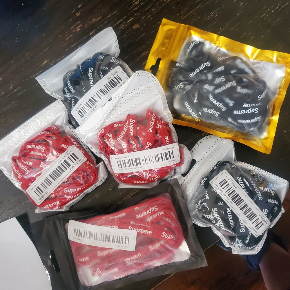 Supreme Red and Black Sneakers
